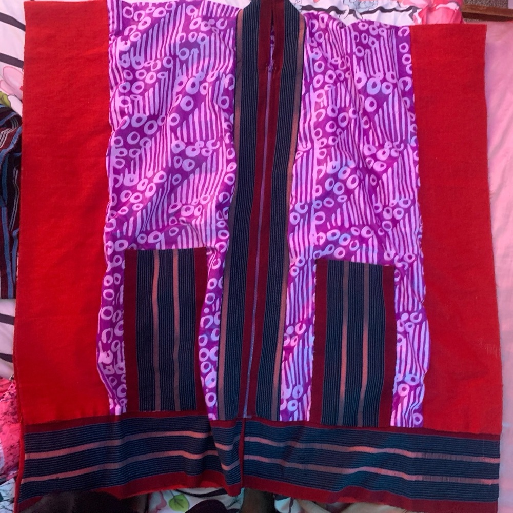 Red and Purple Patterned Textile